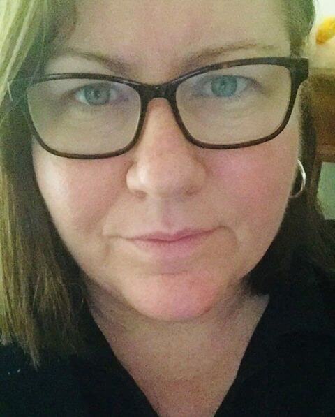 Selfie of Deb A closeup selfie of Deb, a lady with glasses, shoulder length brown hair and blue eyes.