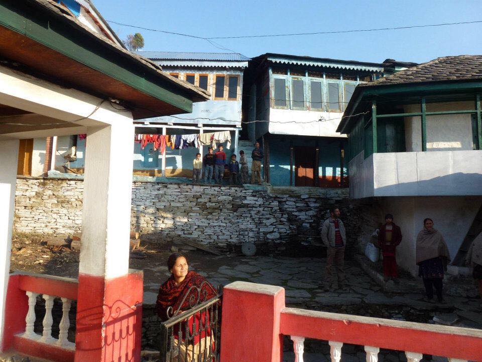 Photo Ellen took in India, showing buildings and young children standing together