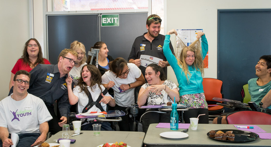 A group of JFY members laughing and making silly faces